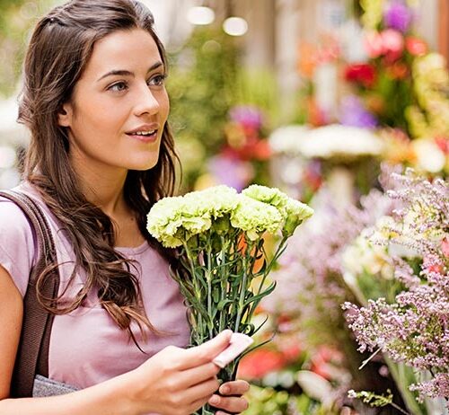 Buy pretty flowers to brighten your day.